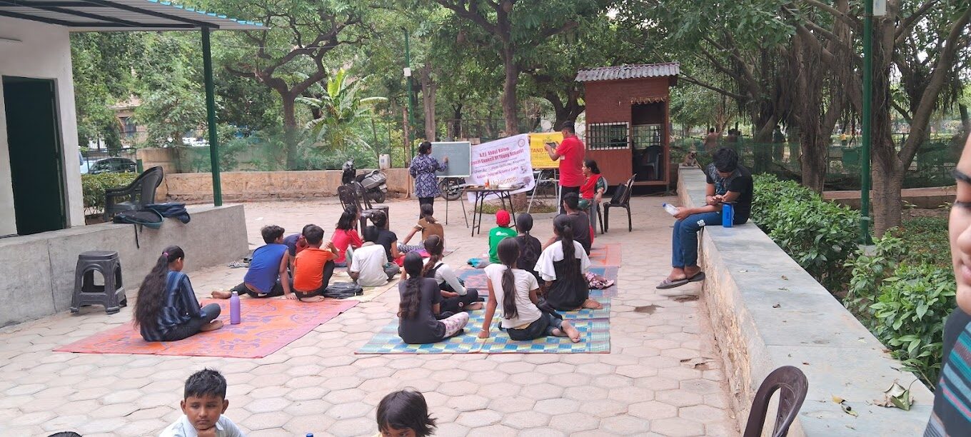 Children participating in an SVSPF confidence-building and public speaking session outdoors