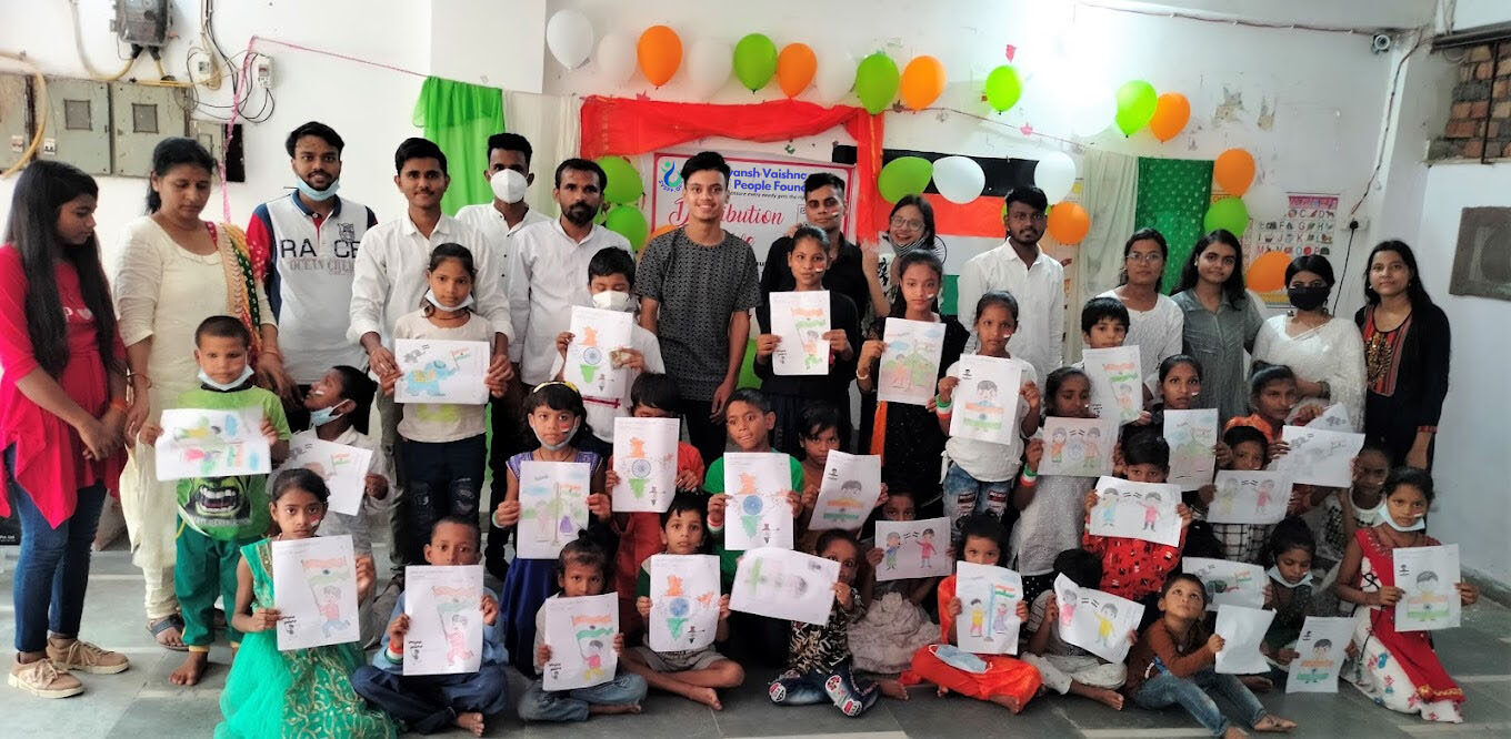 SVSPF volunteers distributing hygiene kits to women in a slum community as part of a health awareness drive